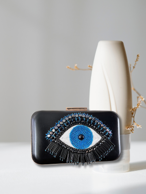Black handmade clutch bag with blue evil eye bead embroidery and hard case design