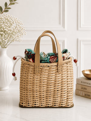 Handmade rattan tote bag for women with woven design and leather handles
