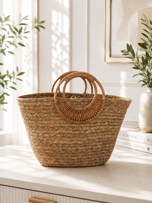 Handmade natural straw handbag with round wooden handles, perfect for summer, beach, travel, and everyday style.